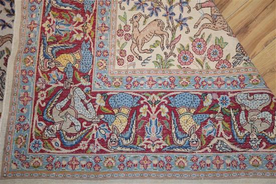 An Isfahan ivory ground pictoral rug (a.f.) 310 x 90cm